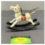 Vintage cast iron rocking horse figurine