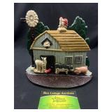 Cast Iron Barn with animals doorstop