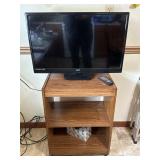 32" Sanyo TV and Rolling pressboard Cart