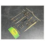 Compasses and drafting tools