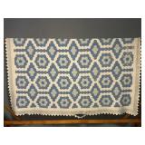 Blue and White Garden Pattern Quilt