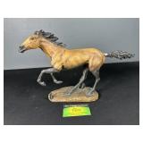 Home Interiors ï¿½Born to Runï¿½ statuette