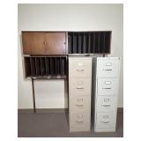 Metal filing cabinets and wooden paper storage