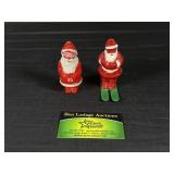 (2) Vintage plastic Santas one on green skis