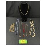 (7) Necklaces including gold tone and agate