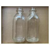 Producers glass qt milk bottles