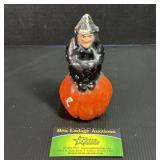 Vintage Paper Mache Witch Sitting on a Pumpkin