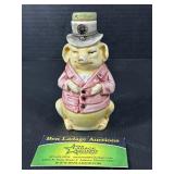 Pig in a tophat bottle