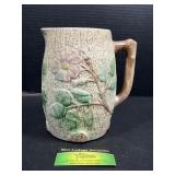 Floral ceramic pitcher