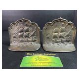 Vintage cast metal bookends depicting sailing ship