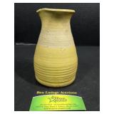 Small glazed ceramic vase with flared rim, ribbed