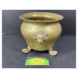 Lions head claw footed brass Cachepot