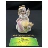 Lefton March birthday girl figurine