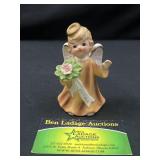 Lefton October birthday girl figurine