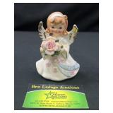 Lefton June birthday girl figurine