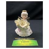 Lefton March birthday girl figurine