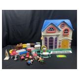 Plastic doll house with accessories