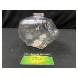 Clear glass piggy bank