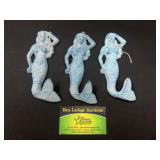 Cast iron mermaid wall hangings