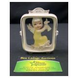 Lefton April birthday girl figurine