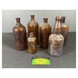 Antique Brown Glass Bottles