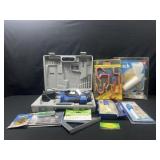 Box with Drill master drill, dremel parts, and