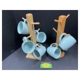 8 pc Corelle coffee mugs & 2 wooden trees