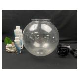 Plastic fishing bowl with fish supplies