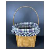 Longaberger handled basket with a liner