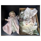 Baby dolls and baby clothes some are Carters