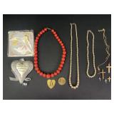 Beaded necklaces, cross pendants and more