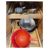 Cabinet with two revere ware pots and more