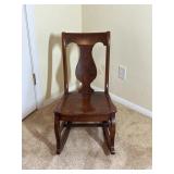 Wooden Rocking Chair with Cutout Design
