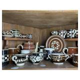 Ceramic brown and cream colored pieces