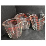 3 Pyrex measuring cups