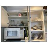 Contents of Cabinets* microwave not included