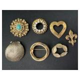 Gold like brooches