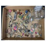 Jewelry pieces in a jar