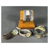 4 wrist watches