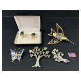 Butterfly, tree brooches, and more