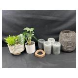 Candles, candle holders, and fake plants