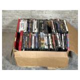 Box Of DVDs Indiana Jones, Sea Biscuit, And More