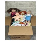 Box of Cabbage Patch Dolls and Clothes