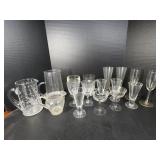 Clear glass pitchers, wine glasses, and more