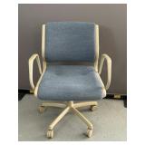 Blue Cushioned Rolling Chair
