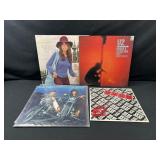 Cheap Trick, U2, and Carly Simon Vinyl Records