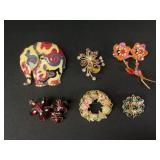 Floral brooches
