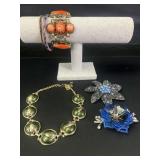 Fashion jewelry bracelets, brooches, and more