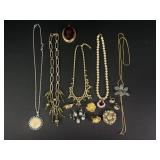 Gold tone necklaces, earrings, and more