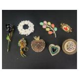 Robert, Kramer, and more brooches